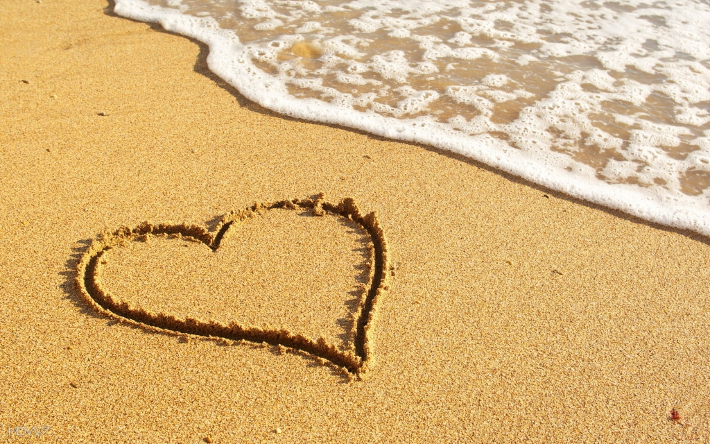 heart-drawn-in-the-sand-on-the-beach